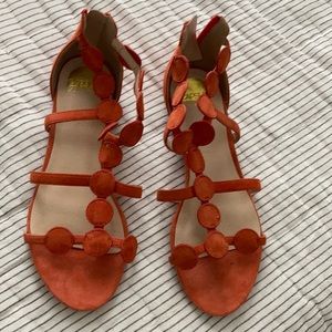 Anthropology collective brand orange sandals.